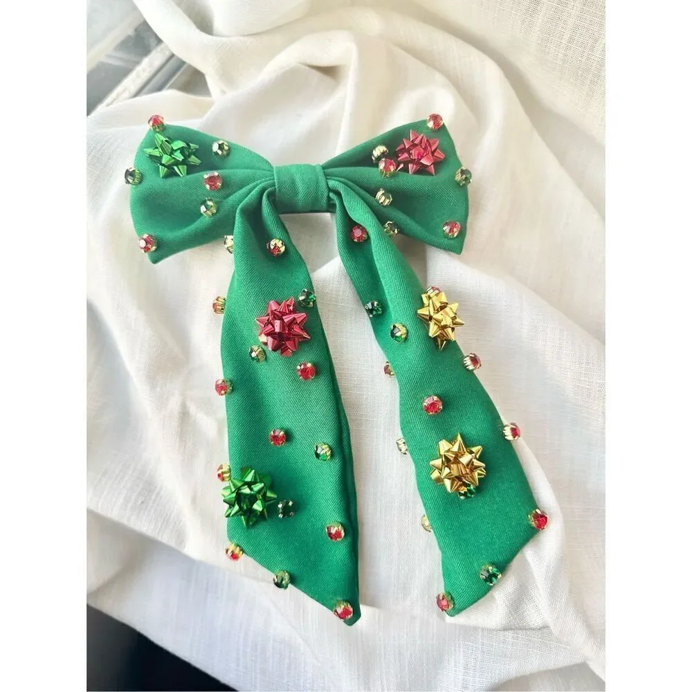 Green holiday hair bow with rhinestone and Christmas chrome bows ￼